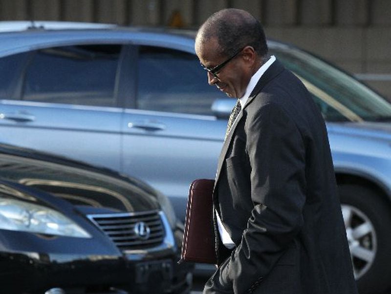  Elvin "E.R." Mitchell, leaving the federal courthouse in Atlanta last week after pleading guilty to one count of conspiracy to commit bribery and launder money.