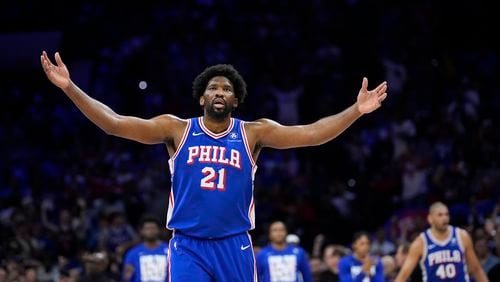 Philadelphia 76ers' Joel Embiid reacts during the first half of Game 6 in an NBA basketball first-round playoff series against the New York Knicks, Thursday, May 2, 2024, in Philadelphia. (AP Photo/Matt Slocum)