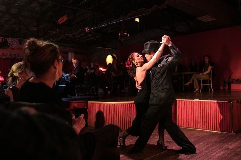 For the Atlanta Opera production of “Maria de Buenos Aires,” the company transformed a room at the antique store Paris on Ponce into a seedy tango club. The dancers and singers perform in an intimate space, inches away from the audience. CONTRIBUTED BY ATLANTA OPERA