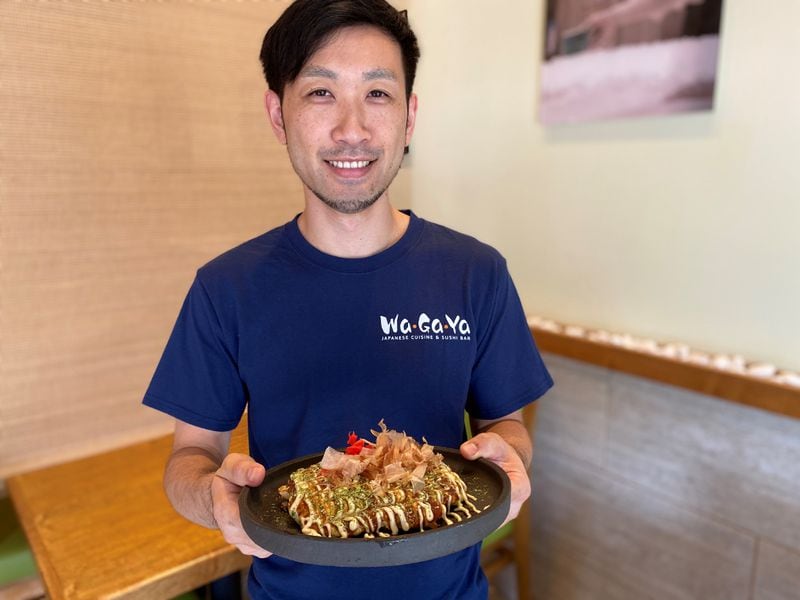 Takashi Otsuka, owner of Wagaya and Chirori restaurants and the new Wagaya Groceries on 14th Street, showed us how to make classic Japanese okonomiyaki. Wendell Brock/For The AJC
