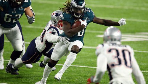 MINNEAPOLIS, MN - FEBRUARY 04: Jay Ajayi #36 of the Philadelphia Eagles carries the ball against the New England Patriots in Super Bowl LII at U.S. Bank Stadium on February 4, 2018 in Minneapolis, Minnesota.  (Photo by Gregory Shamus/Getty Images)