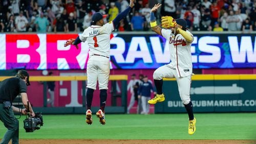 Braves players Ozzie Albies (left) and Ronald Acuña Jr. celebrate after the Braves defeated the Boston Red Sox 4-2 at Truist Park on Tuesday, May 7, 2024, in Atlanta.

(Miguel Martinez/ AJC)