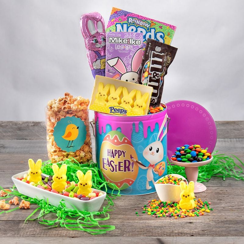 Order a pre-filled Easter basket with sweet treats in a reusable tin from Gourmet Gift Baskets. Contributed by Gourmet Gift Baskets