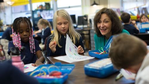 Marietta City Schools Superintendent Dr. Emily Lembeck talks with 1st grade students of Carrie Reeser, a former elementary student of Lembeck's, at West Side Elementary, Wednesday, Nov. 30, 2016, in Marietta, Ga.  BRANDEN CAMP/SPECIAL