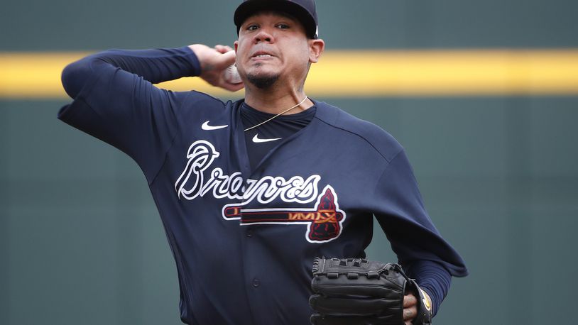Braves starting pitcher Felix Hernandez warms up for Tuesday’s exhibition game  against the Tampa Bay Rays in North Port, Fla.