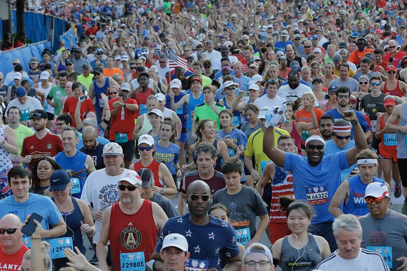 These are photos from the start of the non-elite division of the 2018 Peachtree Road Race.