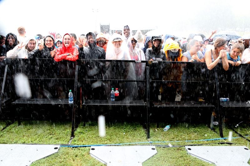 For some fans, rain was no obstacle. (Akili-Casundria Ramsess/Special to the AJC)