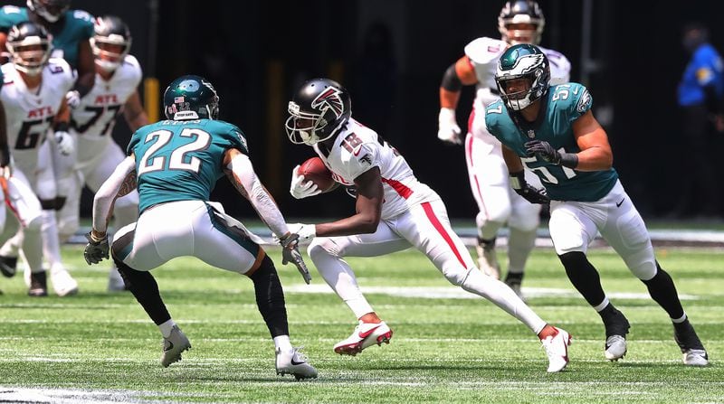 Falcons wide receiver Calvin Ridley makes a first down reception on the game's opening drive against the Philadelphia Eagles Sunday, Sept. 12, 2021, at Mercedes-Benz Stadium in Atlanta. (Curtis Compton / Curtis.Compton@ajc.com)