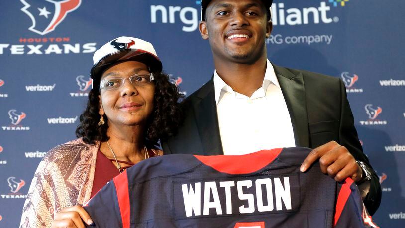 Quarterback Deshaun Watson, right, poses with his mother, Deann, after a Houston Texans news conference Friday, April 28, 2017, in Houston. The Texans drafted Watson in the first round of the 2017 NFL Draft.