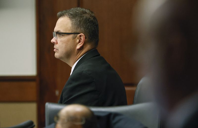 Court of Appeals Judge Christian Coomer sits in a courtroom at Cobb County Superior Court on day one of his trial for alleged ethic violations on Monday, October 17, 2022. (Natrice Miller/natrice.miller@ajc.com)  


