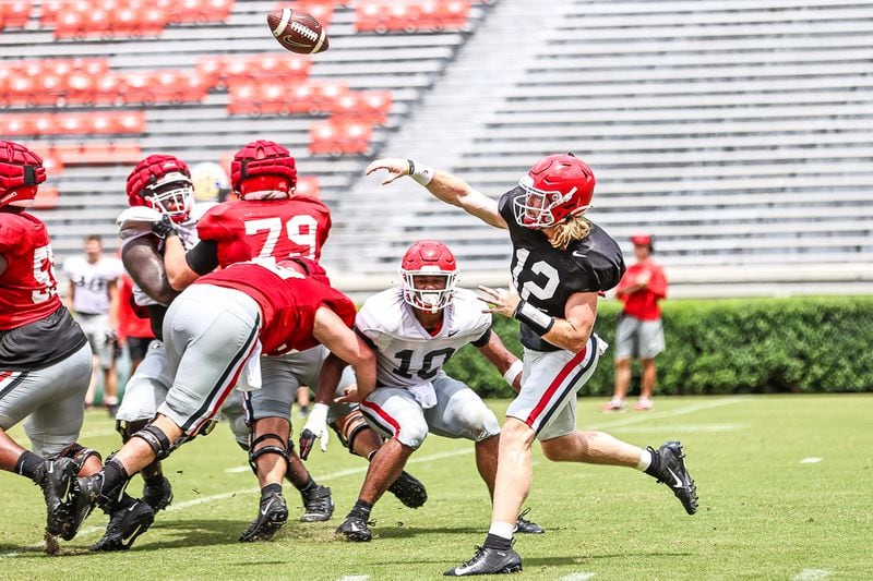Georgia quarterback Brock Vandagriff (12) completes a throw during the Bulldogs’ practice scrimmage Saturday, Aug. 21, 2021, at Sanford Stadium in Athens. (Mackenzie Miles/UGA)