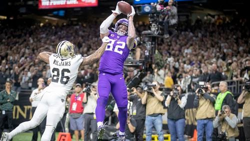 Minnesota Vikings tight end Kyle Rudolph catches the winning touchdown over New Orleans Saints cornerback P.J. Williams in overtime on Sunday, Jan. 5, 2020, at Mercedes-Benz Superdome in New Orleans.