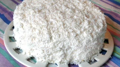 Many who remember Rich’s department store have a special place in their hearts for its Bakeshop’s coconut cake, which isn’t just delicious but also looks like a huge snowball. AJC File
