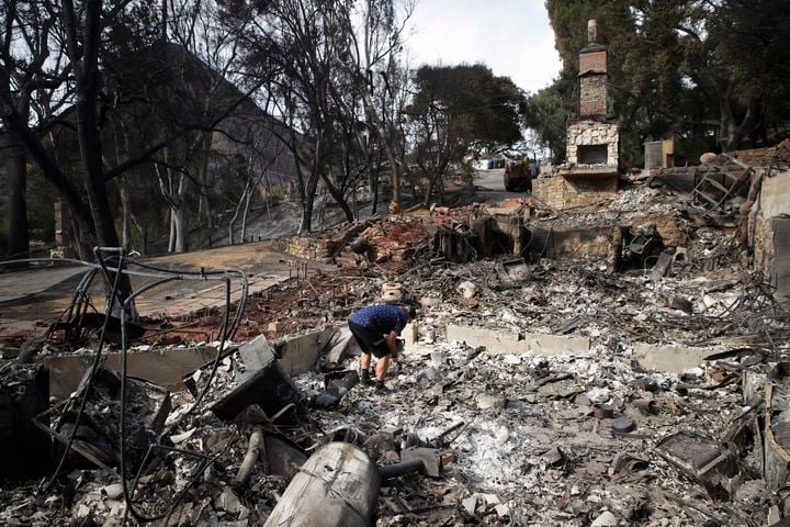 Photos: California wildfires kill dozens, destroy entire town