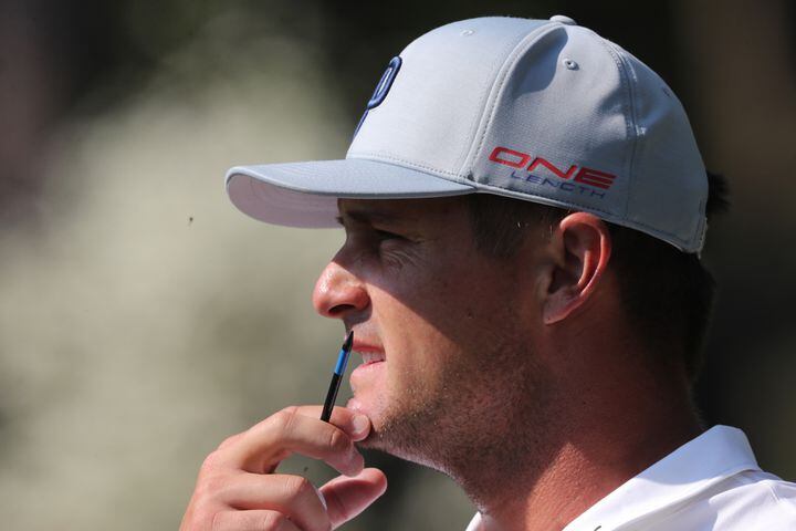 April 7, 2021, Augusta: Bryson DeChambeau prepares to tee off on the fourteenth hole during his practice round for the Masters at Augusta National Golf Club on Wednesday, April 7, 2021, in Augusta. Curtis Compton/ccompton@ajc.com