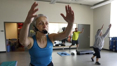 Grace Chalon, group exercise instructor, leads a “tight and toned” class at the fitness and recreation center at TWU in Denton, Texas, on May 11, 2016. (Rose Baca/Dallas Morning News/TNS)