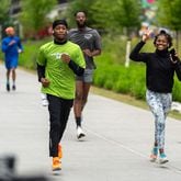 Runners gathered for the first annual Earthgang 5k run on Atlanta's Eastside Beltiline on Saturday, April 17, 2024. Atlanta rap duo Earthgang organized the free through their namesake non-profit foundation, which focuses on sustainability and environmental conservation. (Ben Hendren for The Atlanta Journal-Constitution)