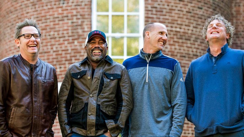 Dean Felber, from left, Darius Rucker, Jim Sonefeld, and Mark Bryan, of Hootie & the Blowfish, pose for a portrait at the University of South Carolina in Columbia, S.C. The band is returning with a tour and album 25 years after “Cracked Rear View” launched the South Carolina-based rock band.