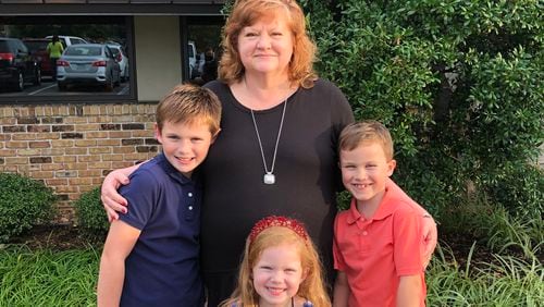 Geri Flanary with, from left, her nephew Cael Flanary, niece Harper Flanary and nephew Blake Flanary. 
Source: Hurst-Scott Funeral Home