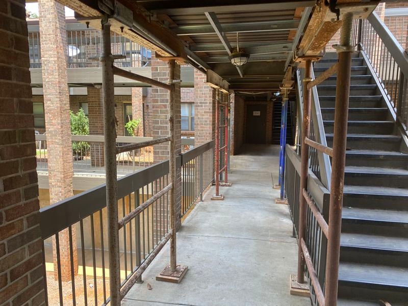 Scaffolding holds up parts of the structure at Pelfrey Pines apartments in Roswell. The building which houses elderly and disabled residents has been condemned by the city of Roswell.