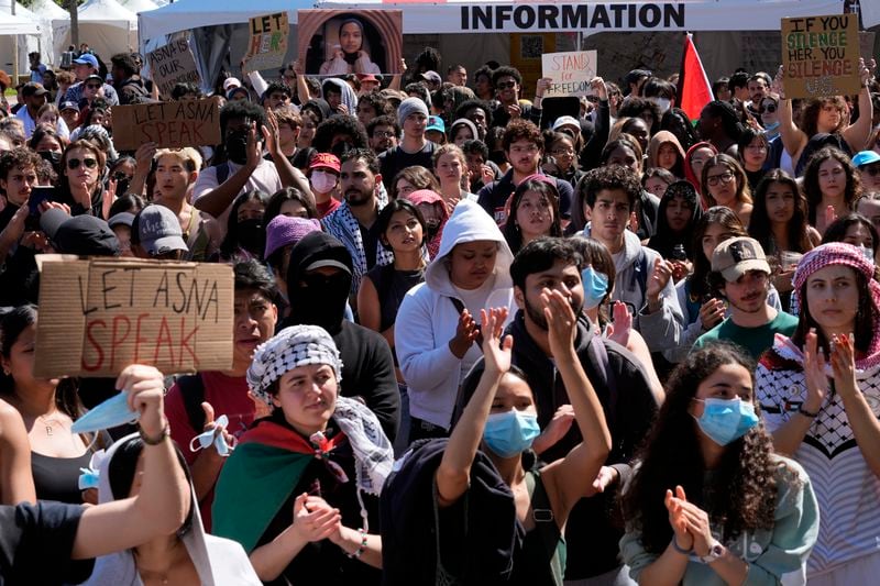 Students protest a canceled commencement speech by its 2024 valedictorian who has publicly supported Palestinians on the campus of University of Southern California on Thursday, April 18, 2024. The University of Southern California was citing security concerns, in a rare decision that was praised by several pro-Israel groups and lambasted by free speech advocates and the country's largest Muslim civil rights organization. (AP Photo/Damian Dovarganes)