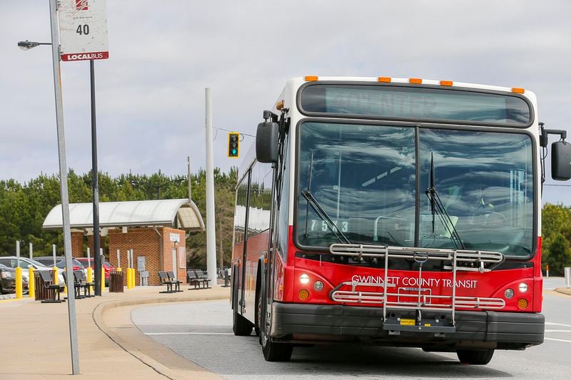 02/26/2019 -- Lawrenceville, Georgia --  A Gwinnett County Transit bus travels along North Brown Road NW near a Gwinnett County Transit Park and Ride bus station in Lawrenceville Tuesday, February 26, 2019.  (ALYSSA POINTER/ALYSSA.POINTER@AJC.COM)