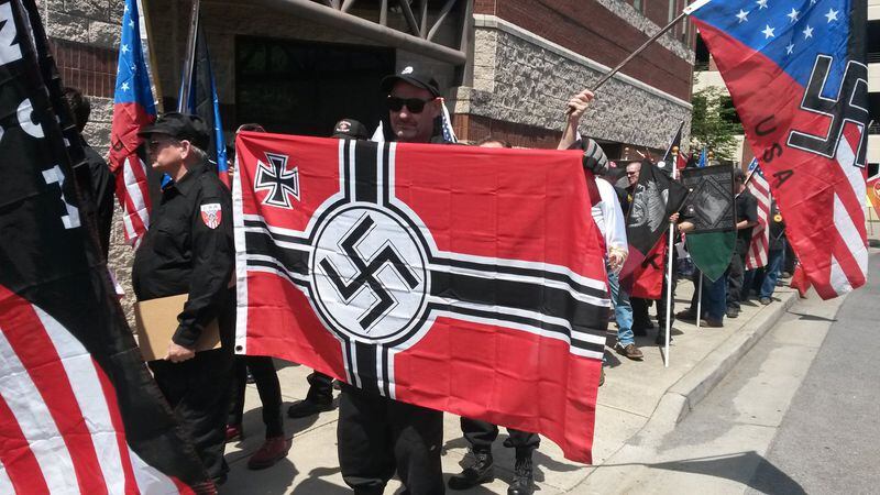 About 80 supporters of the National Socialist Movement, many dressed in black military-style garb, gathered in Rome on April 23. Matt Kempner / AJC file.