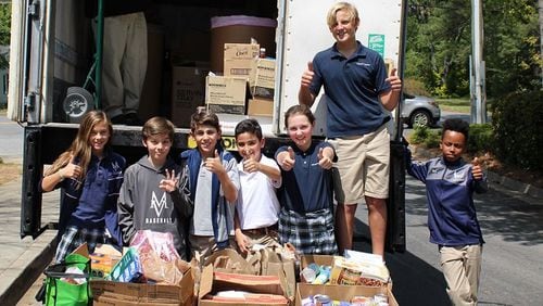 Students at the Mount Vernon Presbyterian School participated in the school’s annual Share the Well Food Drive to support the Community Assistance Center in Sandy Springs. This year’s record-breaking drive donated 5,000 pounds of food to the local nonprofit. Contributed by Community Assistance Center.