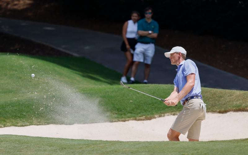 Bartley Forrester of Georgia Tech, who finished third, hits out of a trap during the final round of the Dogwood Invitational golf tournament on June 11 in Atlanta. (Bob Andres / for The Atlanta Journal-Constitution)