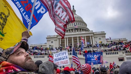 Supporters of President Donald Trump storm the U.S. Capitol building on Wednesday. Many in Washington are concerned that riots will return around the inauguration Jan. 20. Washington Post photo by Evelyn Hockstein