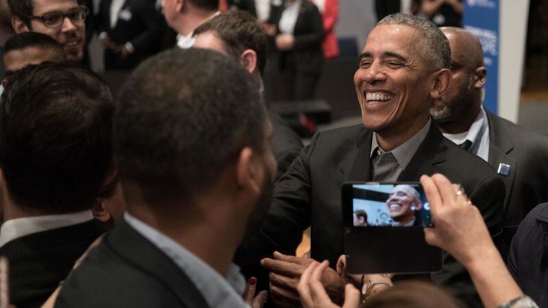 Former President Barack Obama (r) says goodbye after a "Town Hall" event at the European School of Management and Technology. According to his foundation, around 300 young people from Europe who are involved in areas such as civil society, integration or food security took part.