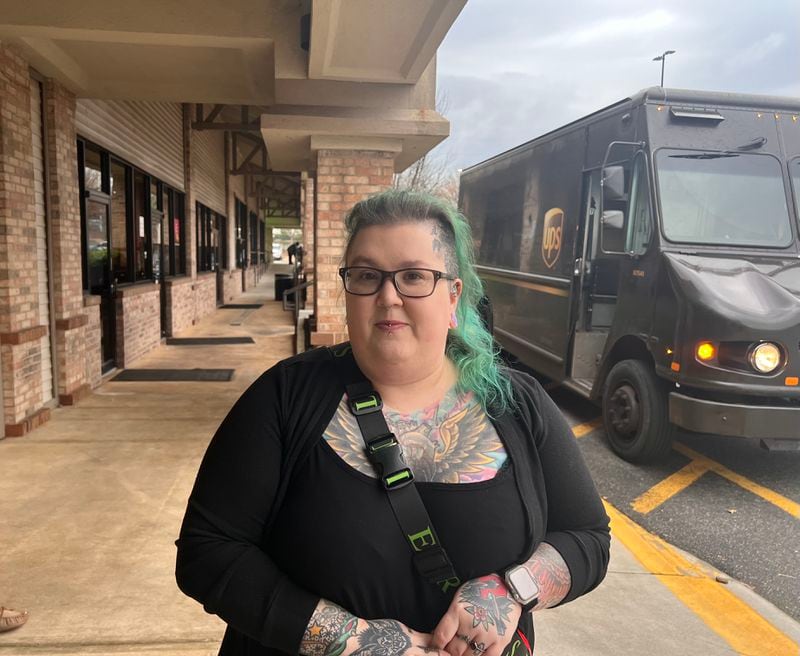 Courtney McKenzie, who runs a small T-shirt company, visited a Dunwoody post office on Friday, and said the delays have been affecting her business and causing customer complaints.