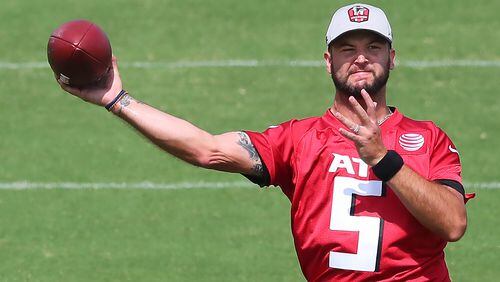 Falcons quarterback AJ McCarron throws a pass during team practice at minicamp Wednesday, June 10, 2021, in Flowery Branch. McCarron is vying to replace Matt Schaub, who retired after the 2020 season, as Matt Ryan's backup. (Curtis Compton / Curtis.Compton@ajc.com)
