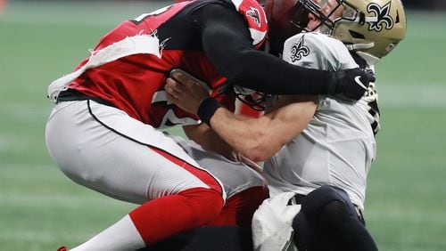 September 23, 2018 Atlanta: Atlanta Falcons linebacker Vic Beasley Jr. sacks New Orleans Saints quarterback Drew Brees during the third quarter in an NFL football game on Sunday, Sept 23, 2018, in Atlanta.   Curtis Compton/ccompton@ajc.com