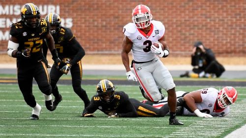 Georgia running back Zamir White (3) runs with the ball during the first half against Missouri Saturday, Dec. 12, 2020, in Columbia, Mo. (L.G. Patterson/AP)