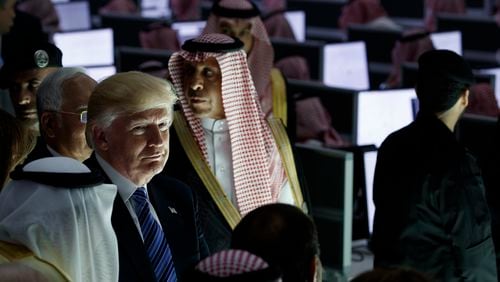 President Donald Trump listens during a ceremony to mark the opening of the Global Center for Combatting Extremist Ideology, Sunday, May 21, 2017, in Riyadh. (AP Photo/Evan Vucci)