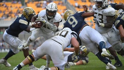 PITTSBURGH, PA - SEPTEMBER 15: TaQuon Marshall #16 of the Georgia Tech Yellow Jackets dives into the end zone for a 7 yard touchdown in the fourth quarter during the game against the Pittsburgh Panthers at Heinz Field on September 15, 2018 in Pittsburgh, Pennsylvania. (Photo by Justin Berl/Getty Images)