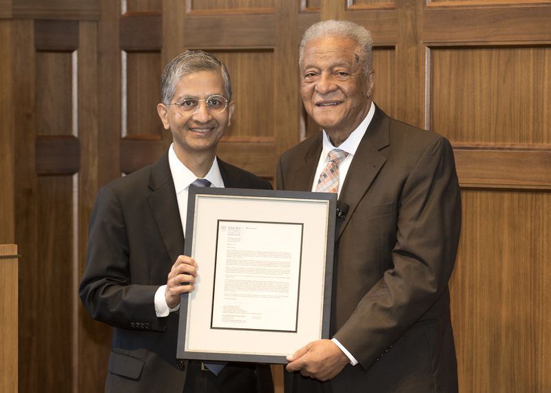 Marion Hood (right) received an apology from Emory School of Medicine Dean Vikas P. Sukhatme, for his 1959 admission rejection because he was Black.