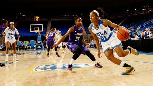 Nirra Fields (21), a senior guard at UCLA, during a game against James Madison University at Pauley Pavilion in Los Angeles, Nov. 20, 2015. Fields, whose journey included three high schools and a half-dozen moves, is a top guard on a top team and a likely WNBA draft pick. (Patrick T. Fallon/The New York Times)