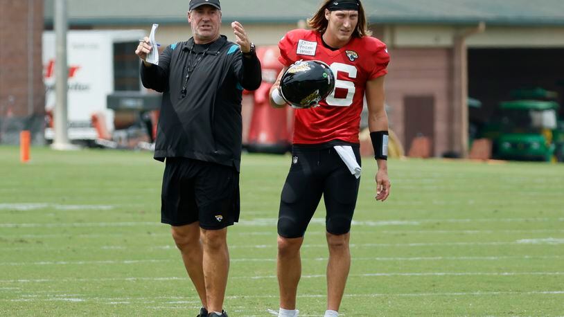 Jaguars coach Doug Pederson gives directions to quarterback Trevor Lawrence during a joint practice with the Falcons on Wednesday in Flowery Branch. (Miguel Martinez / miguel.martinezjimenez@ajc.com)