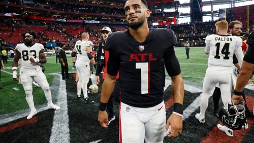 Falcons quarterback Marcus Mariota leaves the field after losing the season-opening game against the Saints on Sunday at Mercedes-Benz Stadium. (Miguel Martinez / miguel.martinezjimenez@ajc.com)