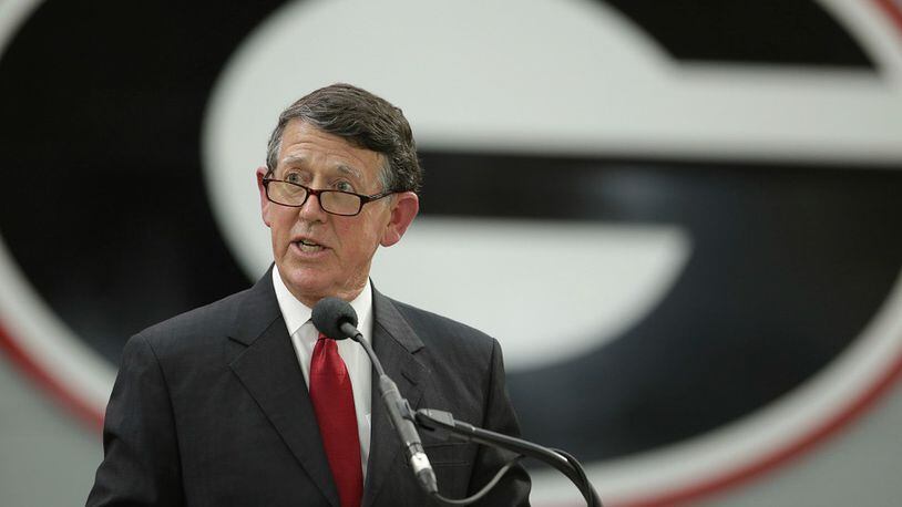 In this Feb. 14, 2017, file photo, UGA athletic director Greg McGarity speaks during a dedication ceremony for the university's new indoor athletic training facility in Athens, Ga.  (John Roark/Athens Banner-Herald via AP, File)/