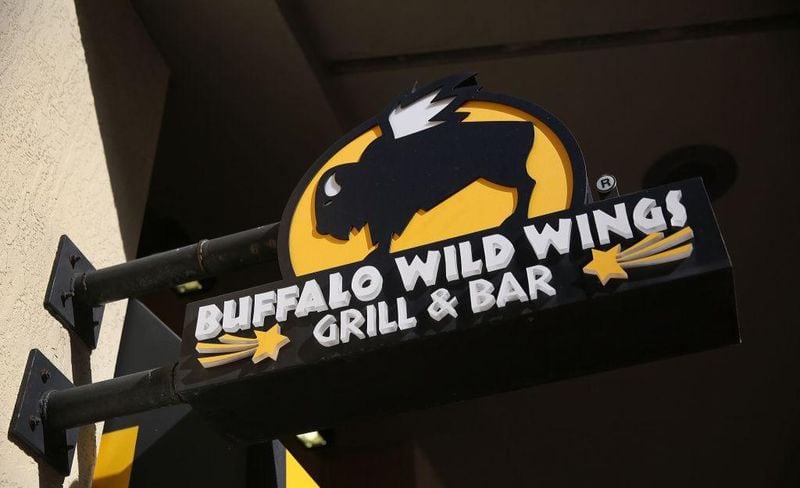 A Buffalo Wild Wings sign is pictured here.  
