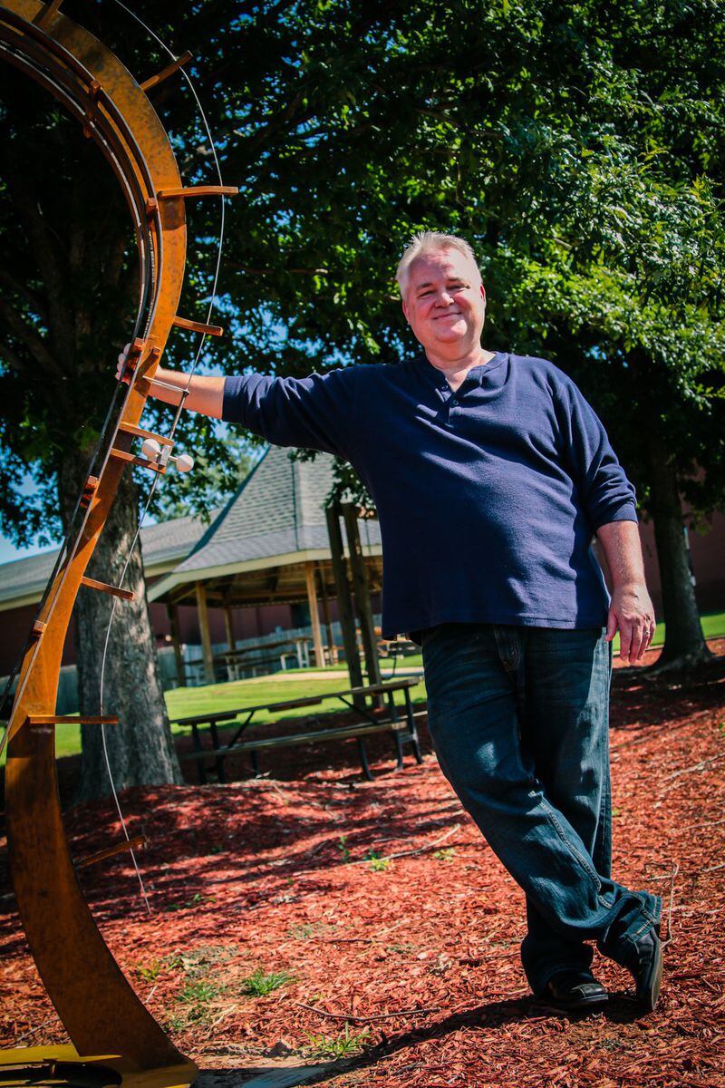 Artist Drew Dylan remembers seeing his first eclipse as a young boy. He has been fascinated by them ever since and created this eclipse sculpture. CONTRIBUTED BY PAUL BARA / CITY OF SUWANEE