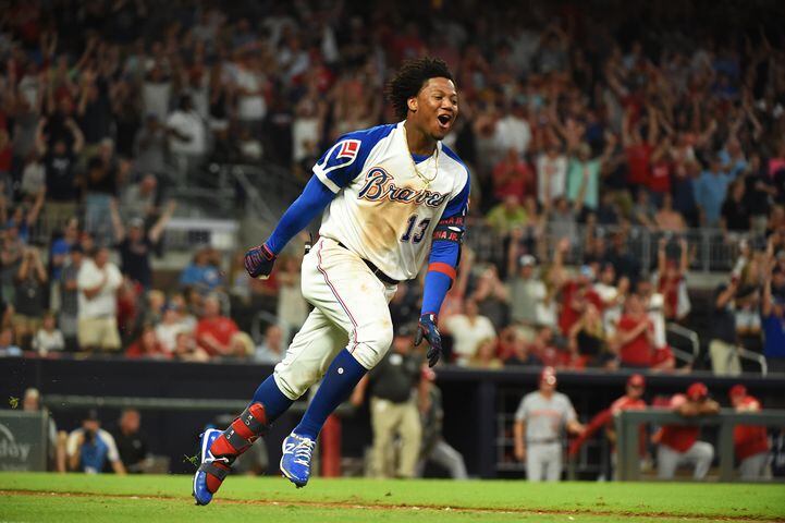 Photos: Ronald Acuna, Braves celebrate a walk-off win over the Reds