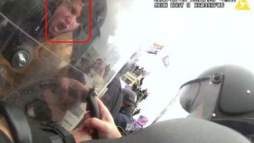 Police body camera footage shows a man authorities identify as 20-year-old Jake Maxwell of Athens fighting with police on the U.S. Capitol West Plaza on Jan. 6, 2021. Maxwell was arrested Feb. 10, 2022, and charged with six criminal counts, including assaulting a police officer.