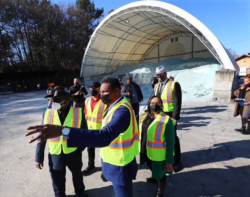 Atlanta Mayor Andre Dickens (center from left), Congresswoman Nikema Williams and Atlanta Department of Transportation Commissioner Josh Rowan take a tour of the ATLDOT North Avenue facility in January. (Curtis Compton / Curtis.Compton@ajc.com)