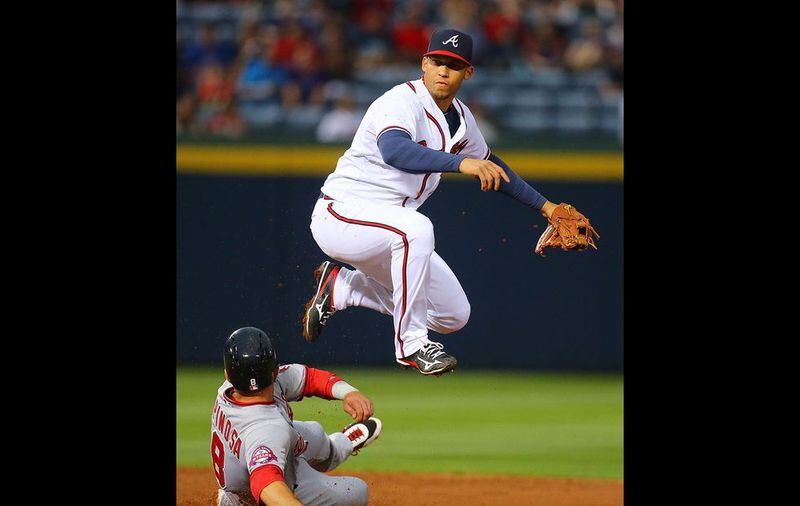 Andrelton Simmons kept doing his thing on a night when the Braves' pitching fell apart. (Curtis Compton/AJC)