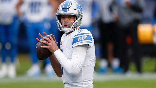 FILE - In this Dec. 20, 2020, file photo, Detroit Lions quarterback Matthew Stafford looks to past against the Tennessee Titans during the first half of an NFL football game in Nashville, Tenn. (AP Photo/Wade Payne, File)