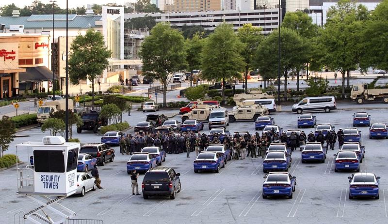 May 30, 2020 -  Atlanta -  Georgia National Guard units deploy at Lenox Square  as protests continued for a second day.  Protests over the death of George Floyd in Minneapolis police custody spread around the United States on Saturday, as his case renewed anger about others involving African Americans, police and race relations.    Jenni Girtman for the Atlanta Journal Constitution